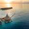 Фото отеля Outrigger Maldives Maafushivaru Resort 5* 9